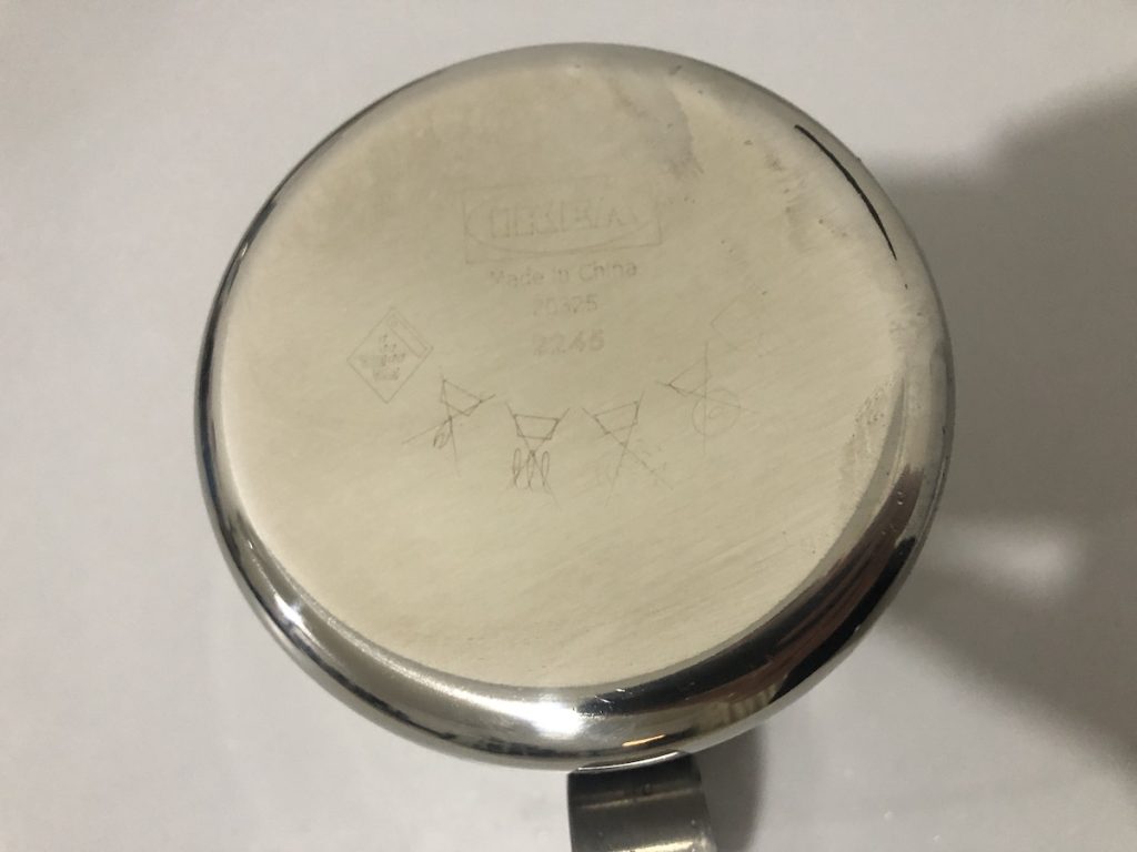 bottom of the milk frother with a warning