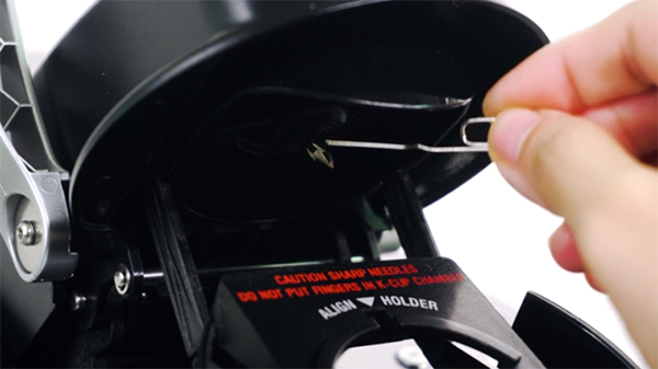 Use a paperclip to clean your Keurig needles. Unwind the clip if necessary, to avoid your fingers touching the sharp needles