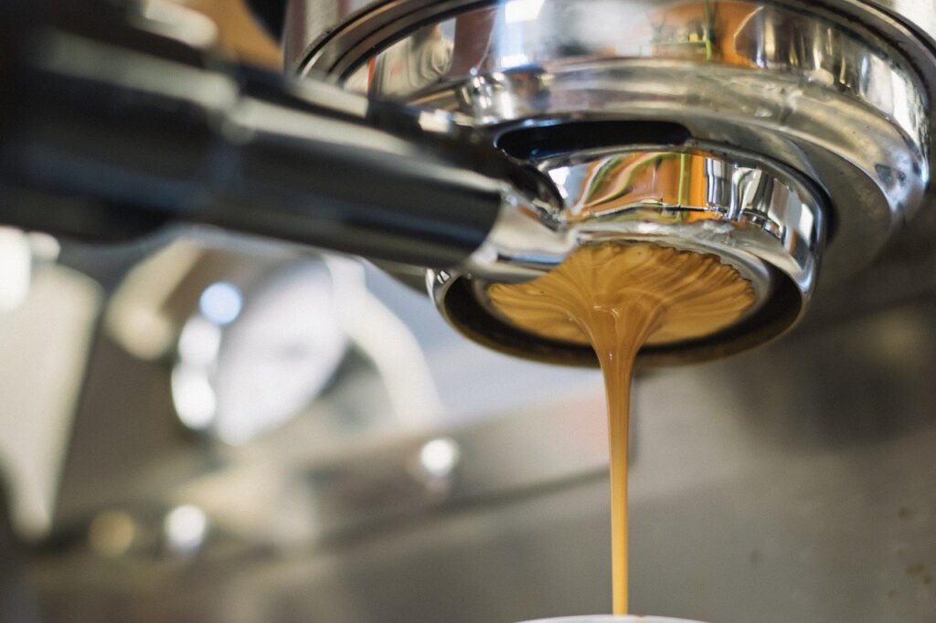 Italian espresso machine making coffee