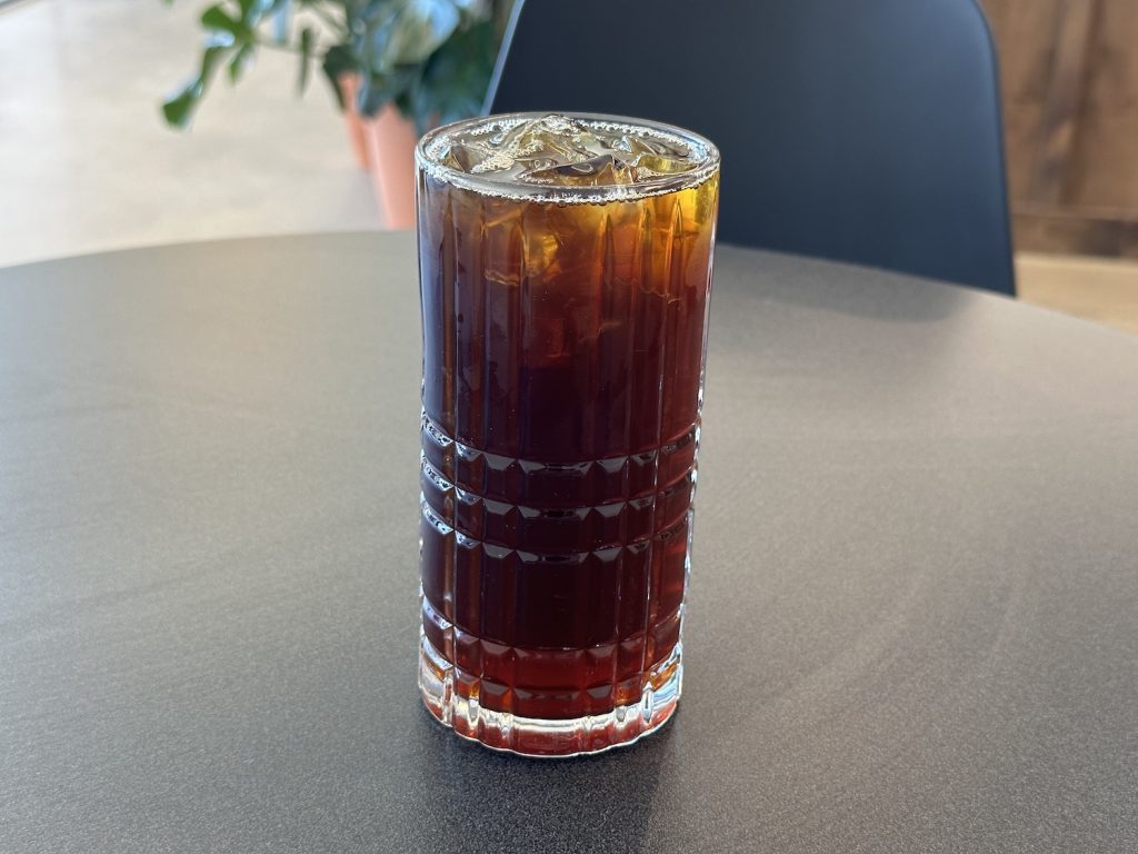 a tall glass of flash brew pour over coffee in the Japanese style