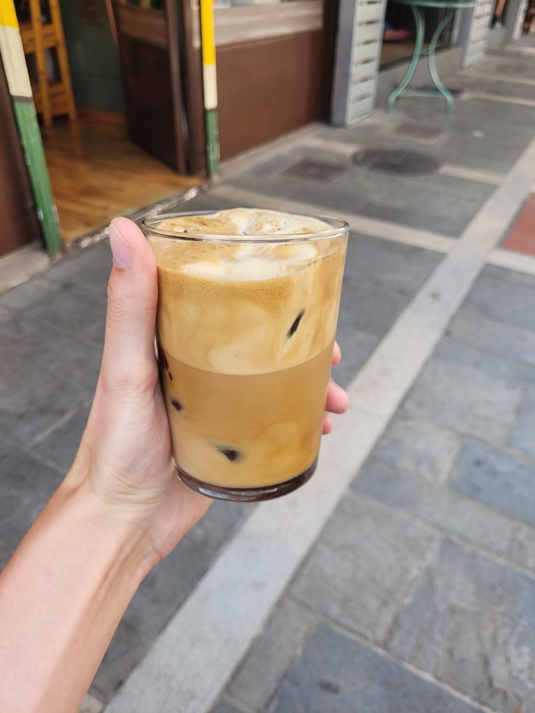 Holding a Greek Nescafe Frappe