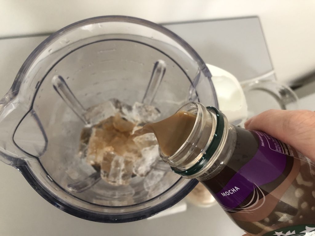 making a frappuccino at home with the bottle