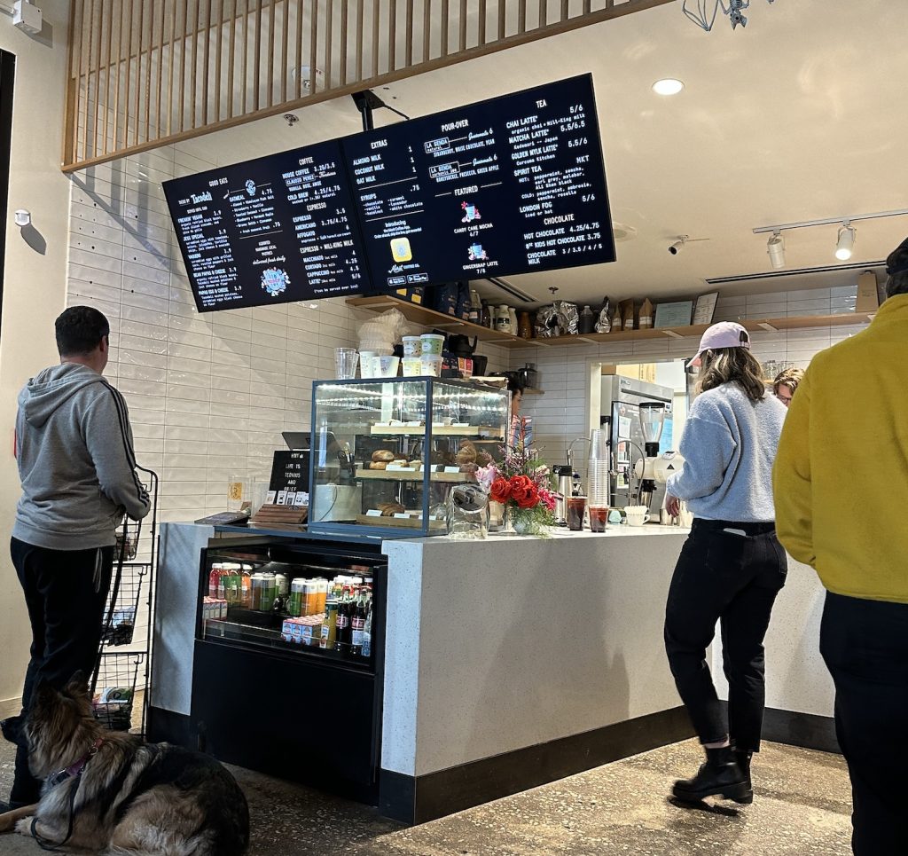 Merit Coffee Dallas coffee shop at the Highland Park location interior shot of menu and counter
