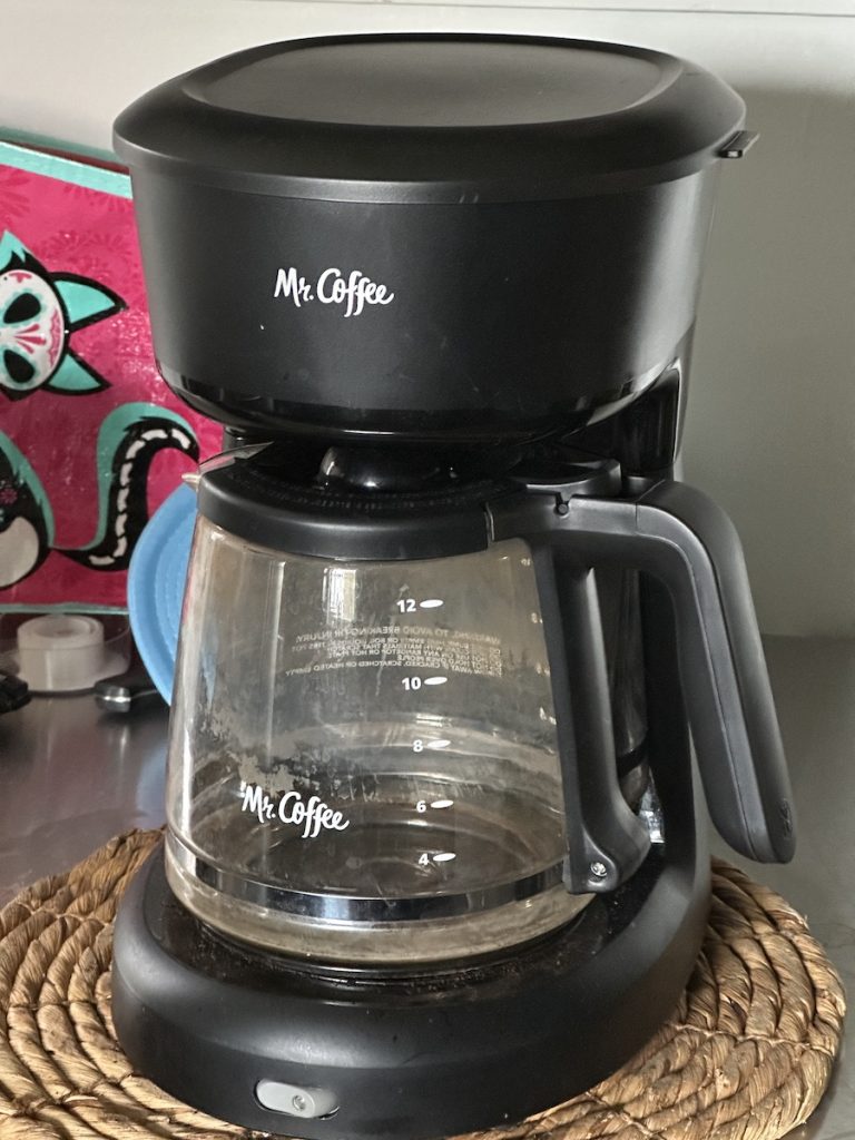 Mr. Coffee maker with numbers on the side of the carafe. 4 6 8 10 12
