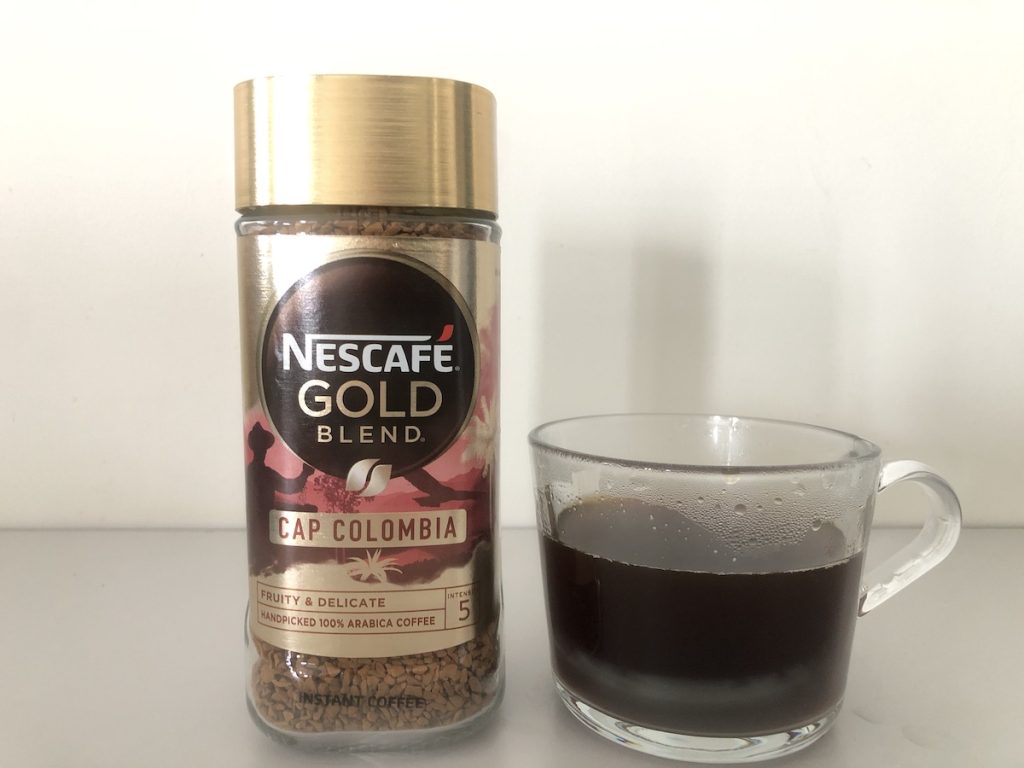 cup of nescafe gold blend cap columbia coffee